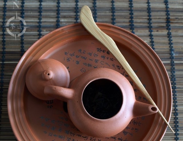 clay teapot on a tea boat